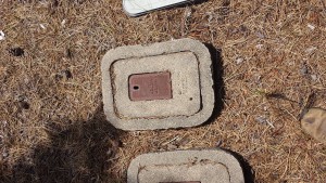 This cement meter box is typical of the way meters were first installed in the District going back to the late 1960's.